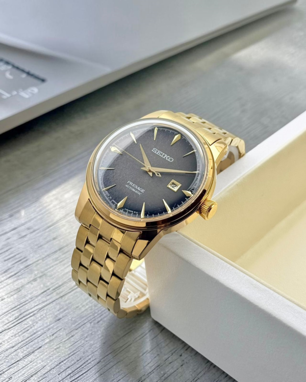 Seiko Presage gold black dial watch