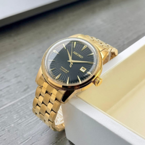 Gold-tone black dial automatic watch